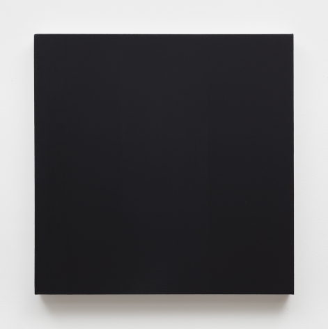 Painting of black square hanging on white wall